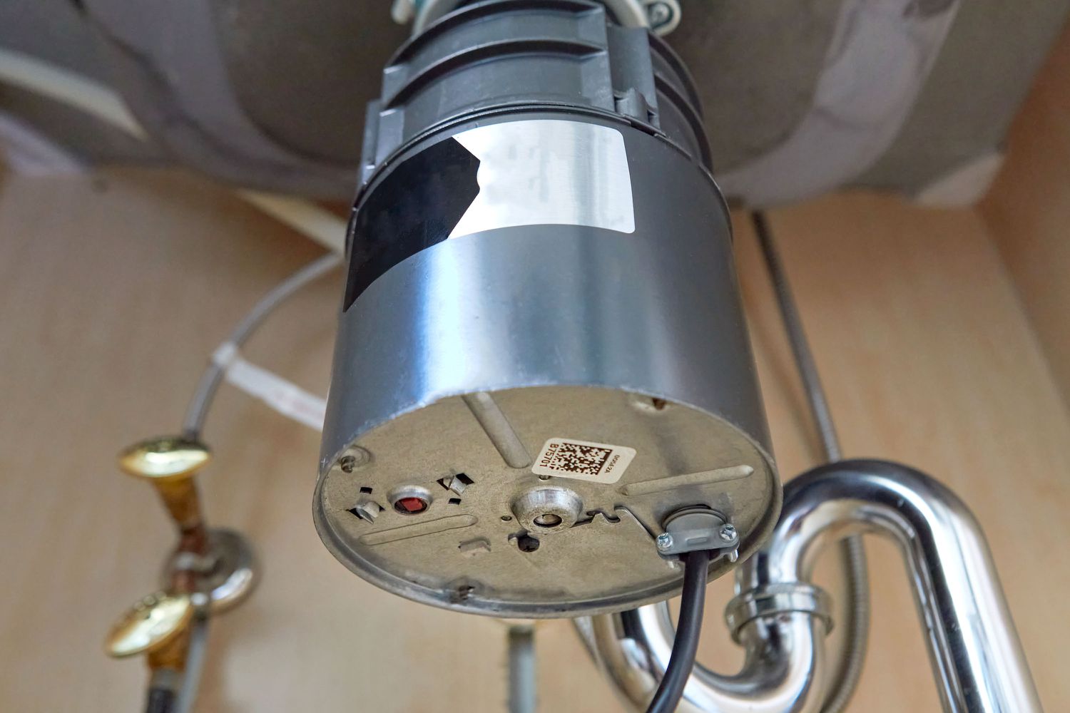 Why Is My Garbage Disposal Humming? Common Causes and Fixes